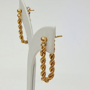 Boucles d'oreilles torsadées pendantes en Or Jaune 18k