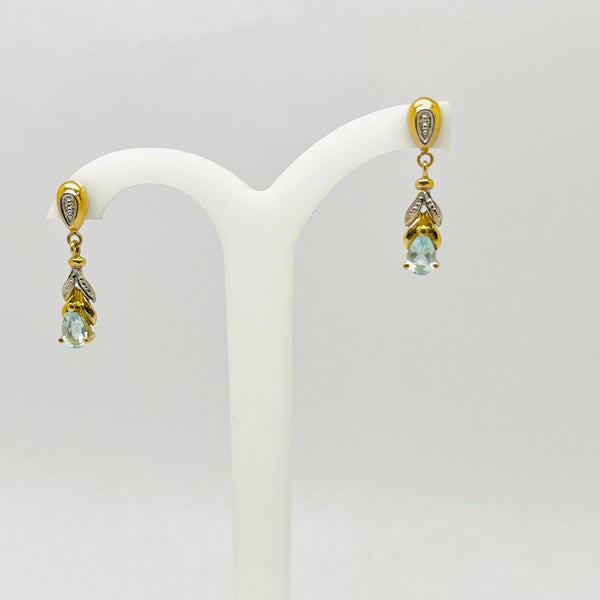 Boucles d'oreilles pendantes en or jaune et blanc 18 K