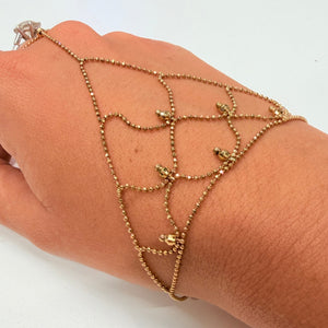 Bracelet main en or jaune 18 K