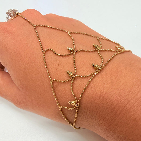 Bracelet main en or jaune 18 K
